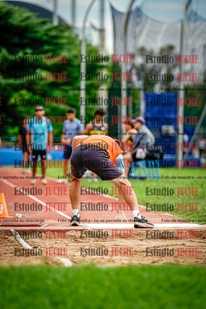 Fotos del salto en largo de varones