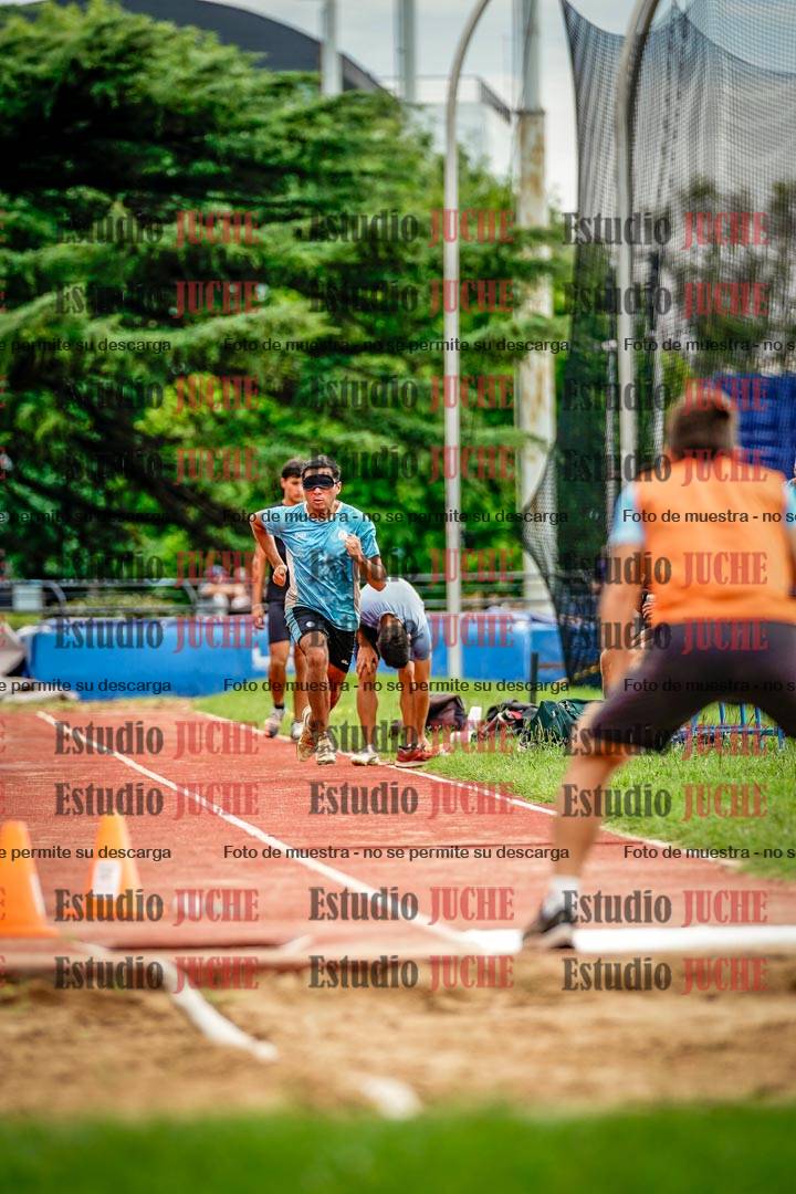 Fotos del salto en largo de varones