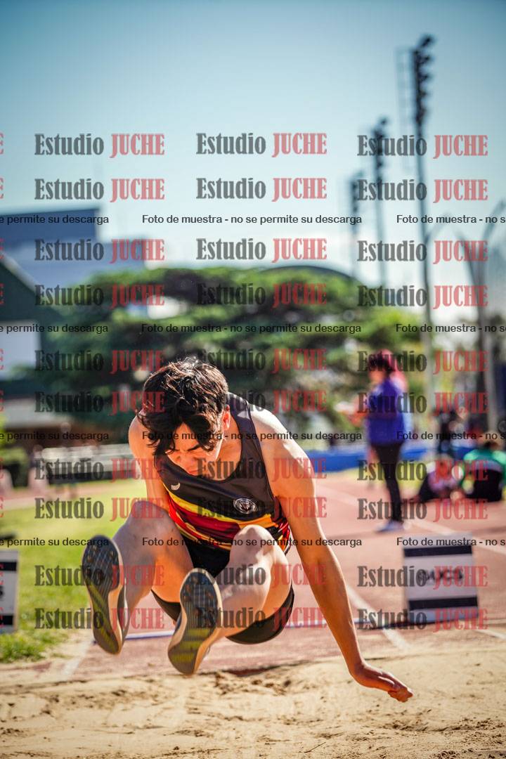 Fotos del salto en largo de varones