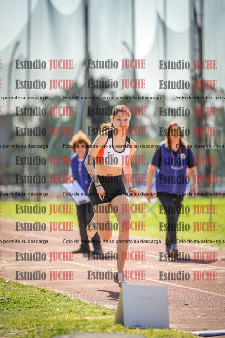 Fotos del salto en largo de mujeres - ambas categorías
