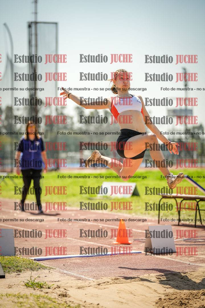 Fotos del salto en largo de mujeres - ambas categorías