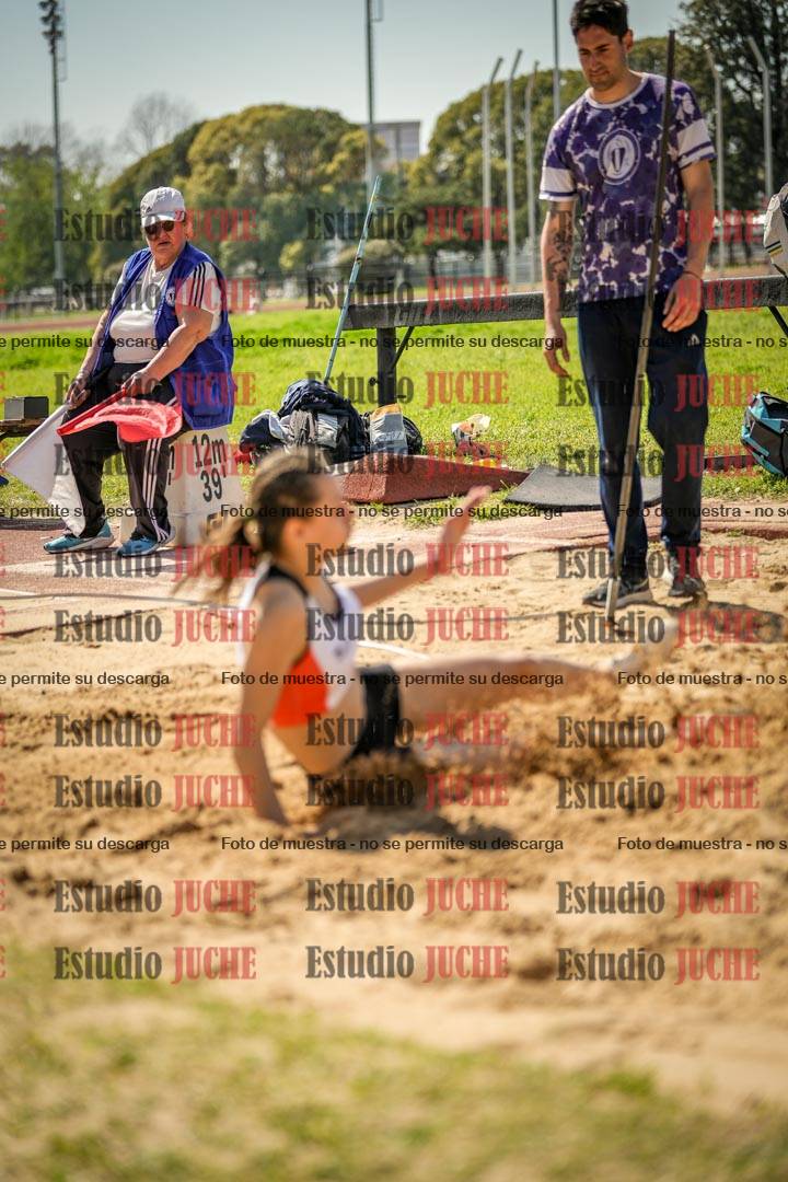 Fotos del salto en largo de mujeres - ambas categorías