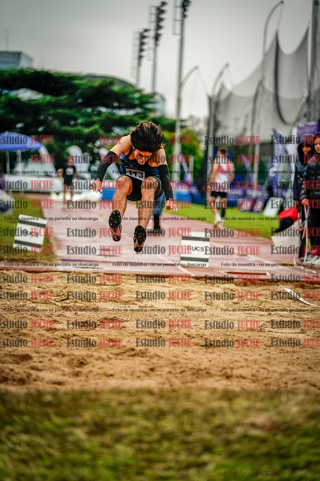 Fotos del salto en largo de varones
