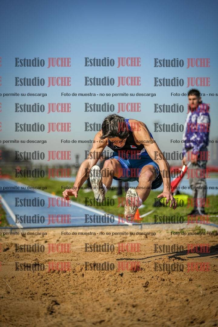 Fotos del salto en largo de varones
