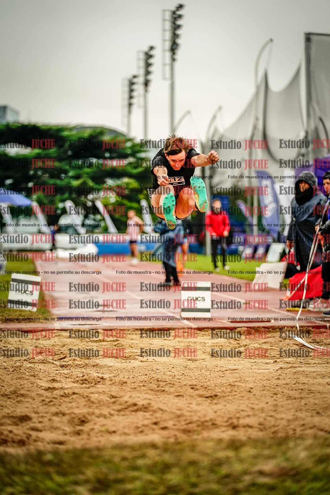 Fotos del salto en largo de varones