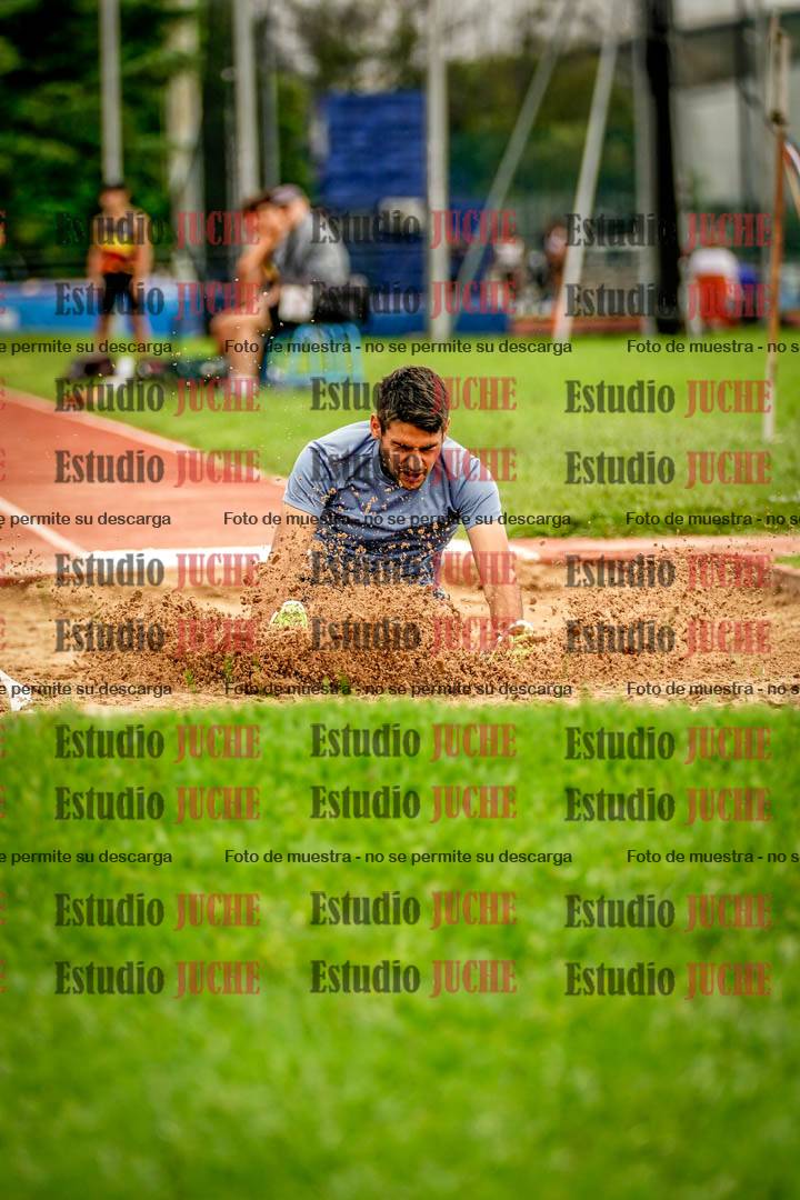 Fotos del salto en largo de varones
