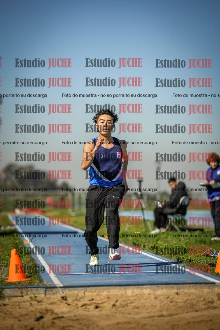 Fotos del salto en largo de varones