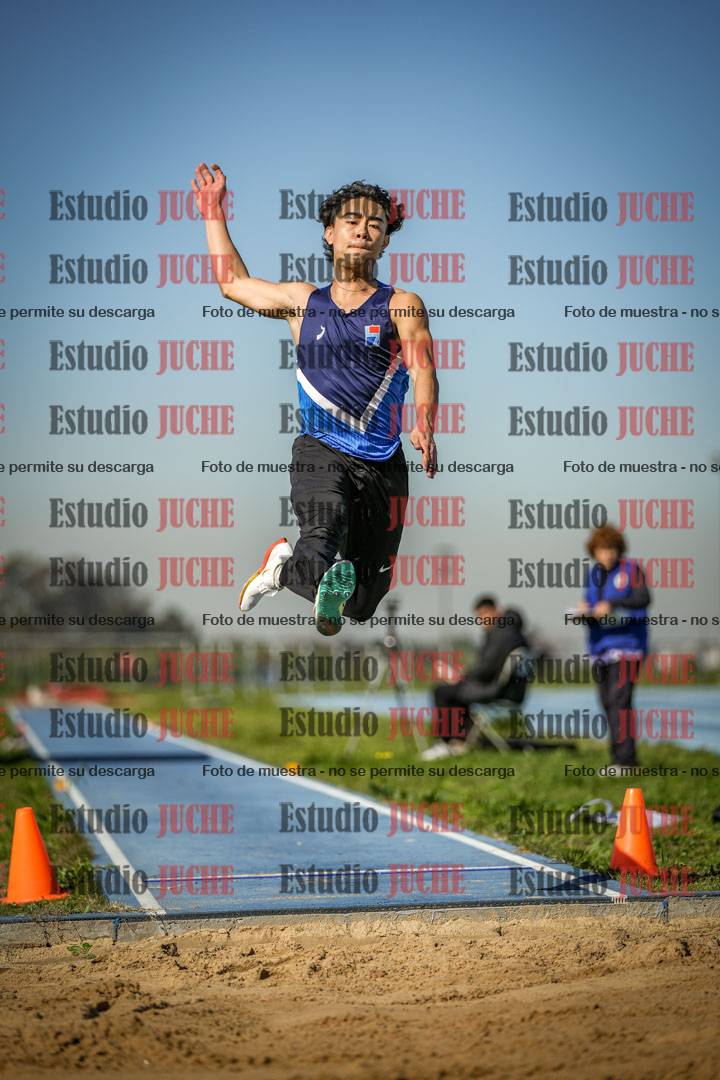 Fotos del salto en largo de varones