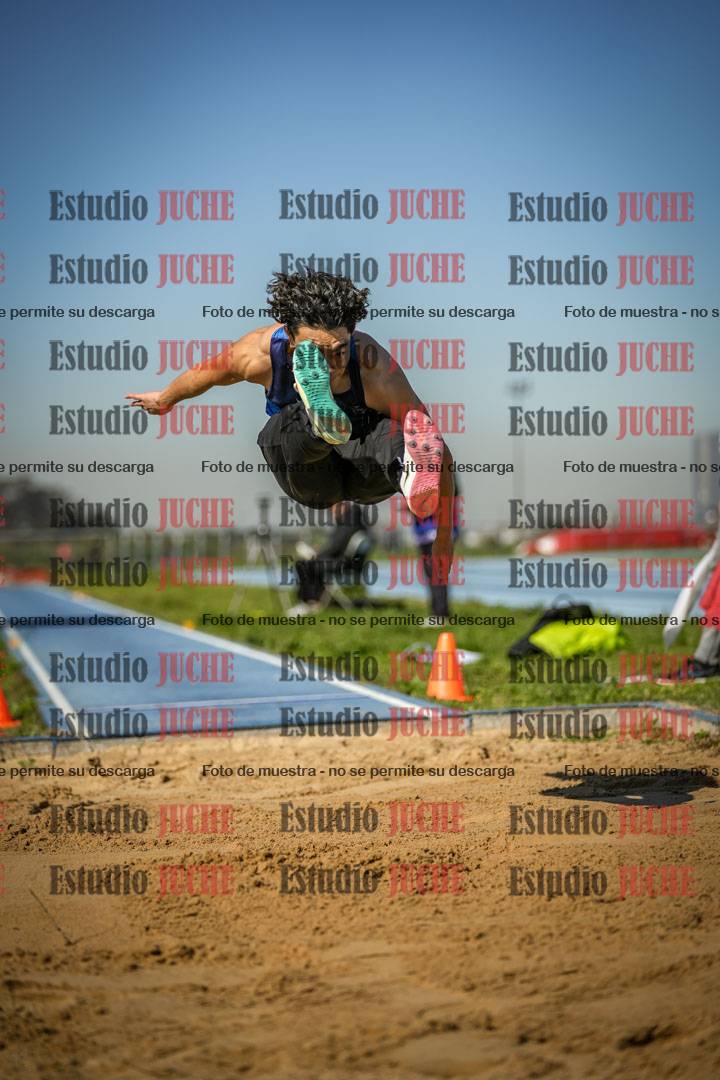 Fotos del salto en largo de varones