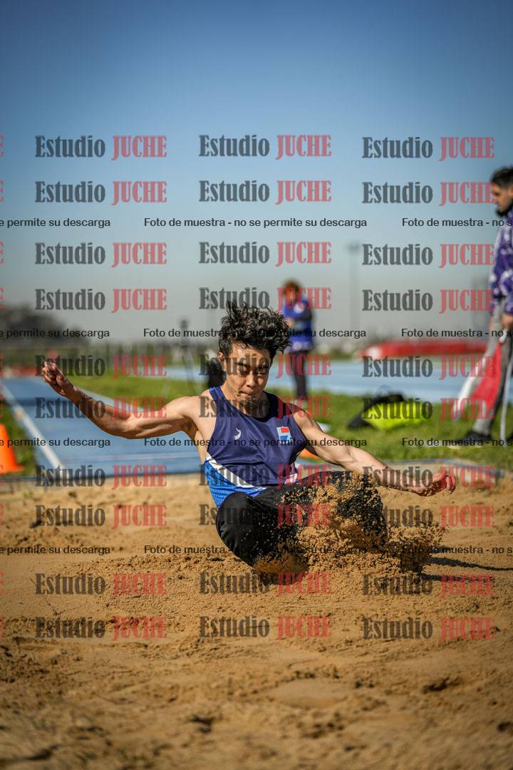 Fotos del salto en largo de varones