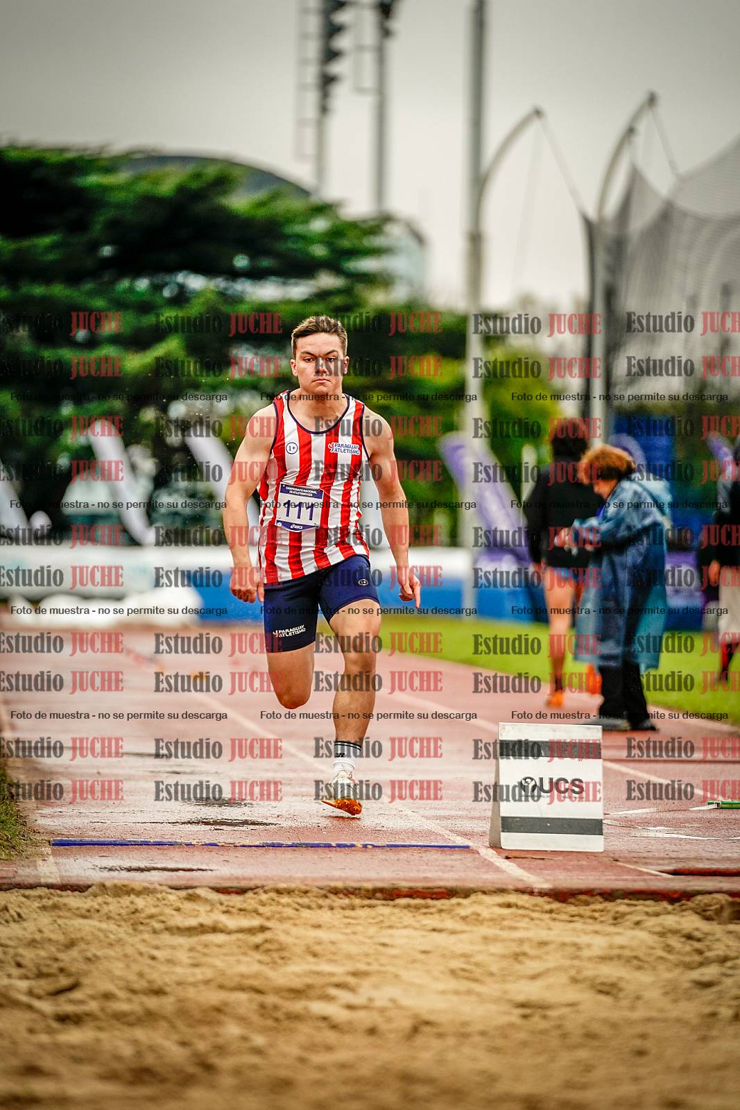 Fotos del salto en largo de varones