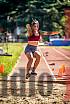 Fotos del salto en largo de mujeres