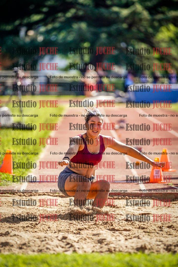 Fotos del salto en largo de mujeres