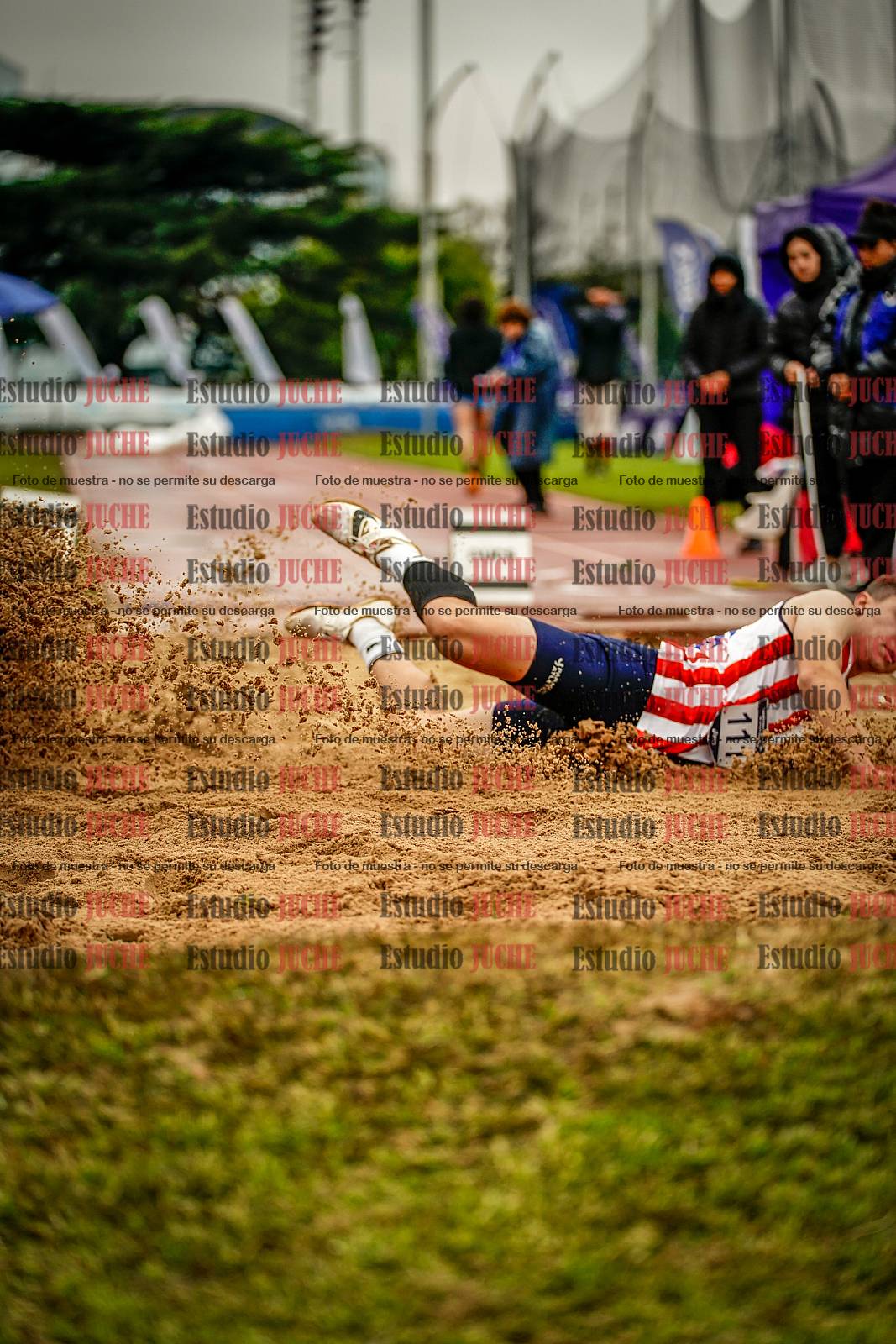 Fotos del salto en largo de varones