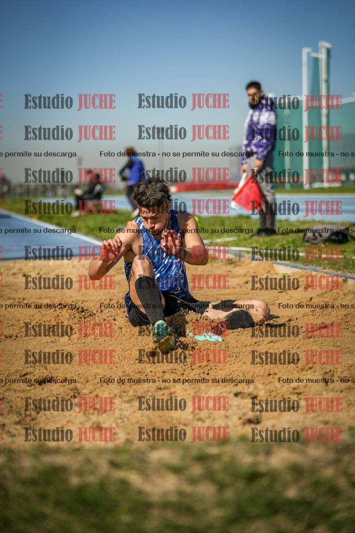 Fotos del salto en largo de varones