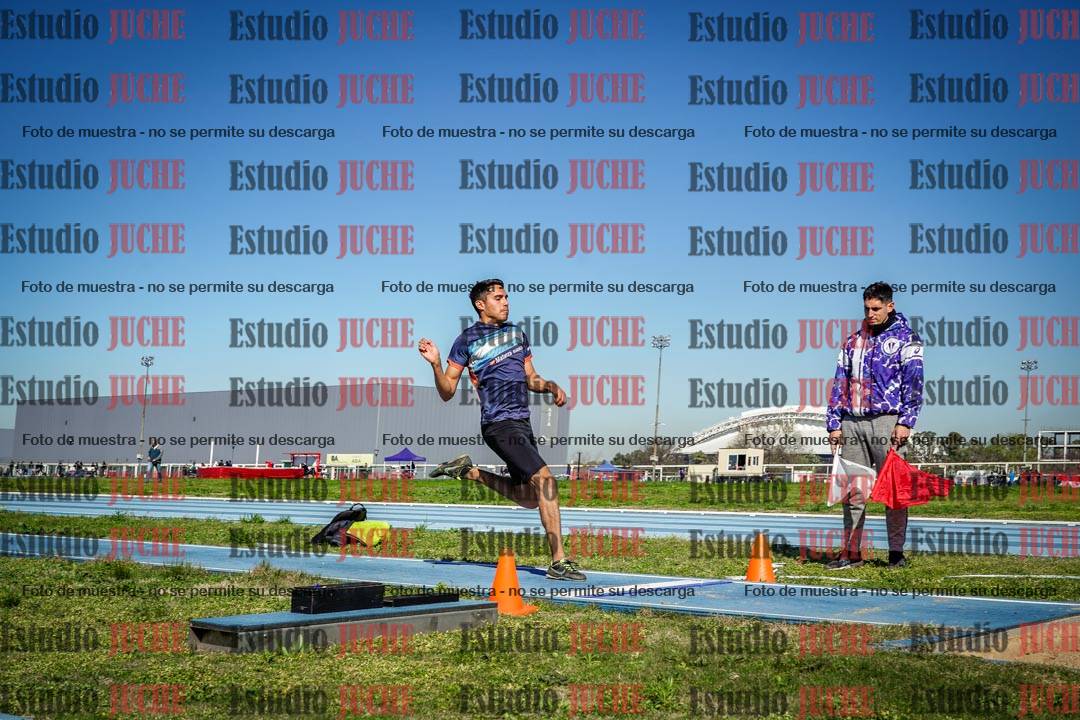 Fotos del salto en largo de varones