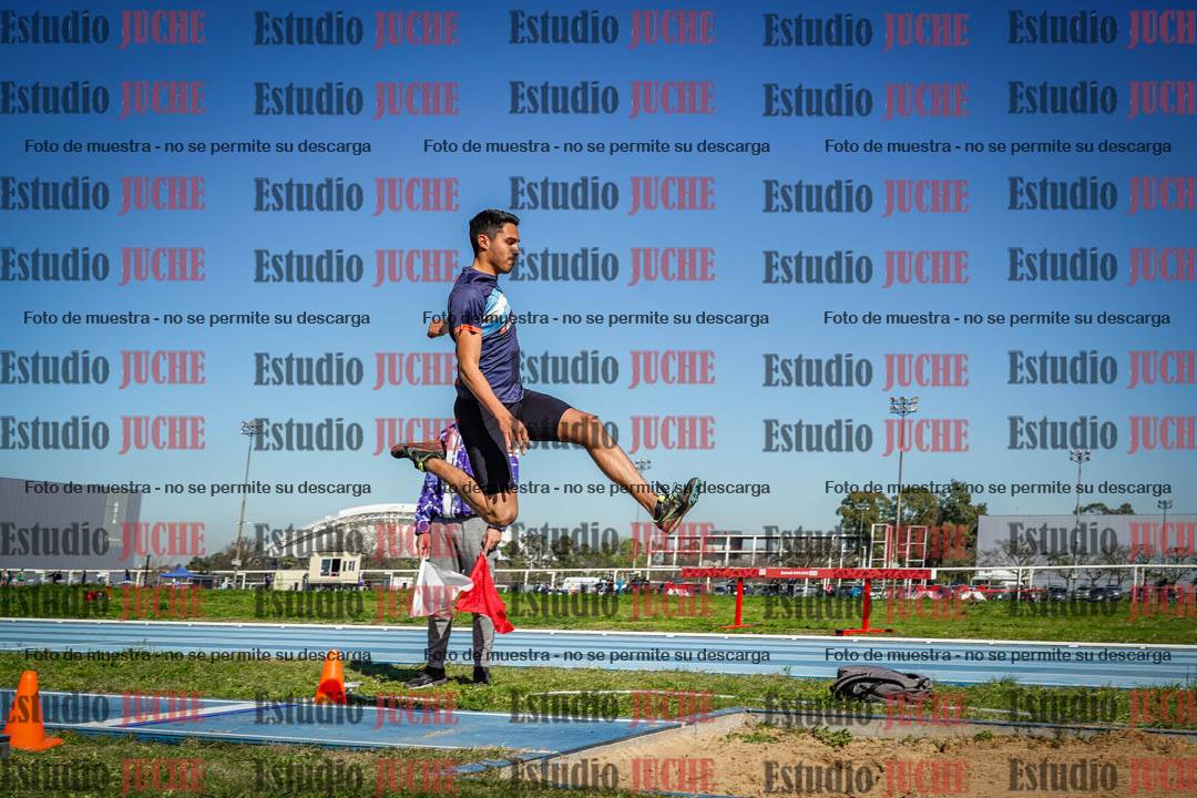 Fotos del salto en largo de varones