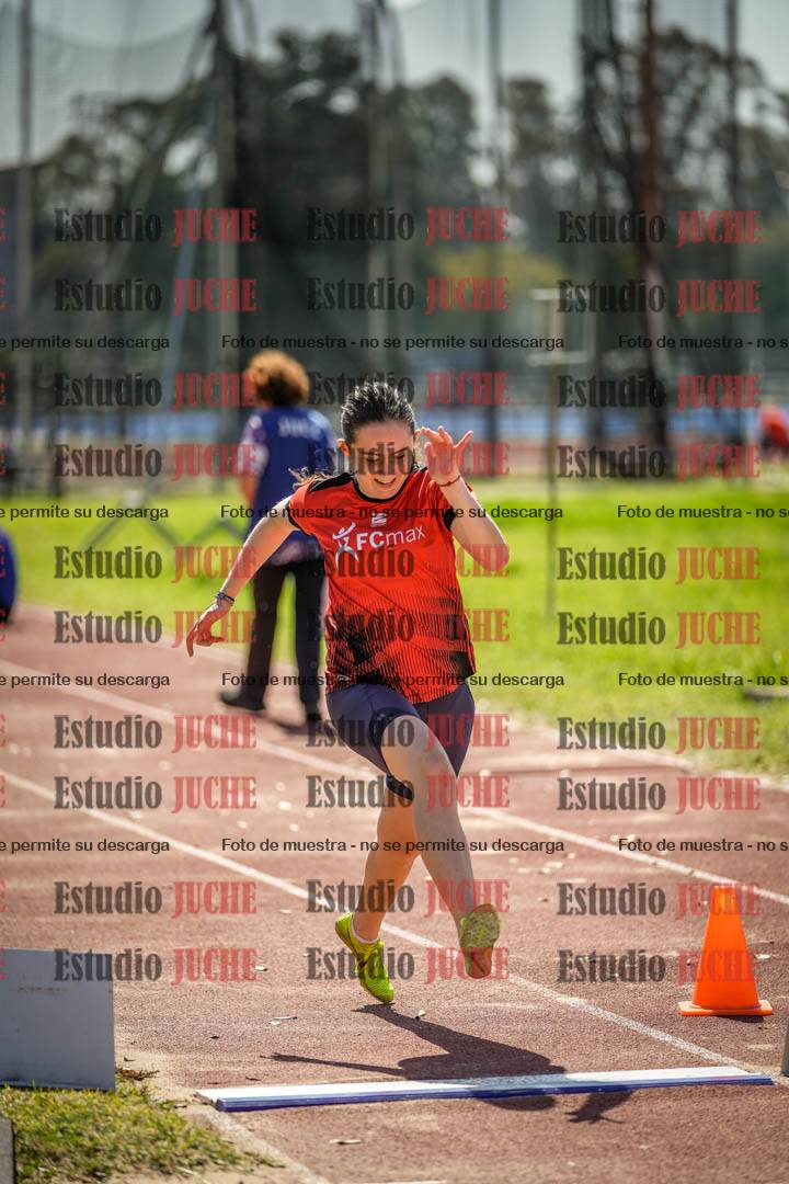 Fotos del salto en largo de mujeres - ambas categorías
