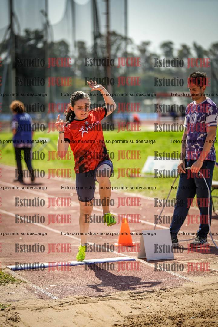 Fotos del salto en largo de mujeres - ambas categorías