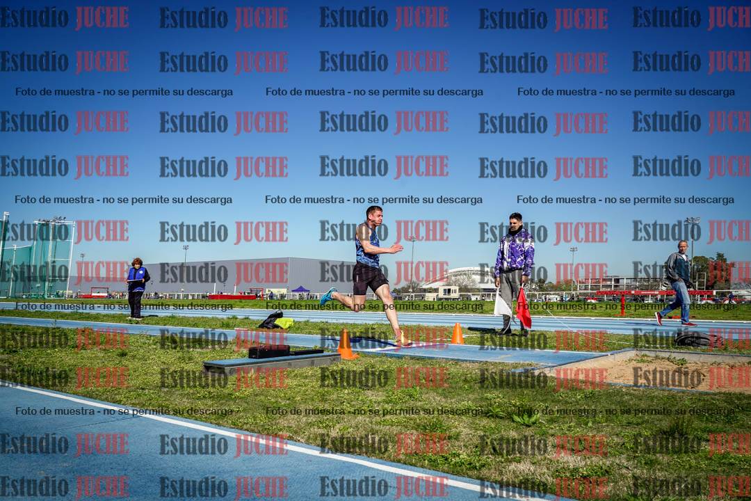 Fotos del salto en largo de varones