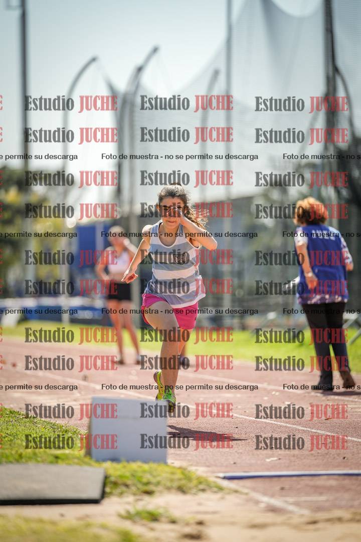 Fotos del salto en largo de mujeres - ambas categorías