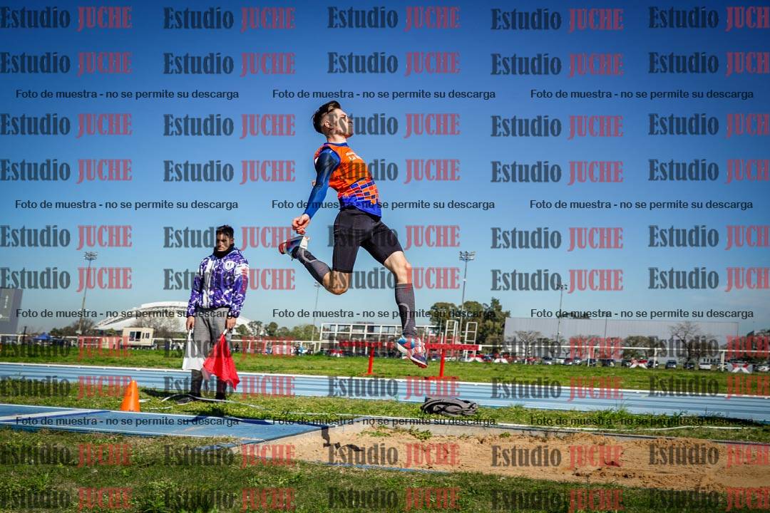 Fotos del salto en largo de varones