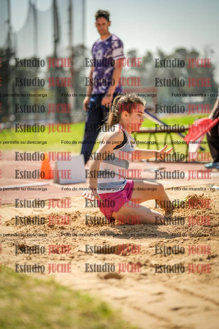 Fotos del salto en largo de mujeres - ambas categorías