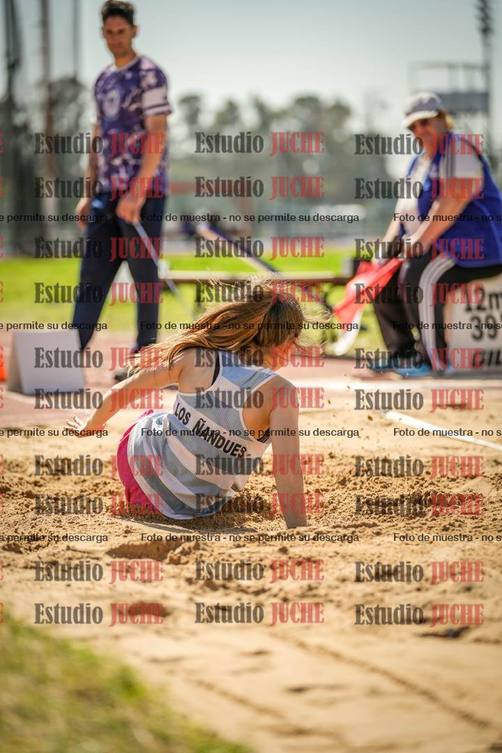 Fotos del salto en largo de mujeres - ambas categorías