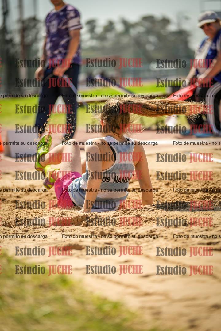 Fotos del salto en largo de mujeres - ambas categorías