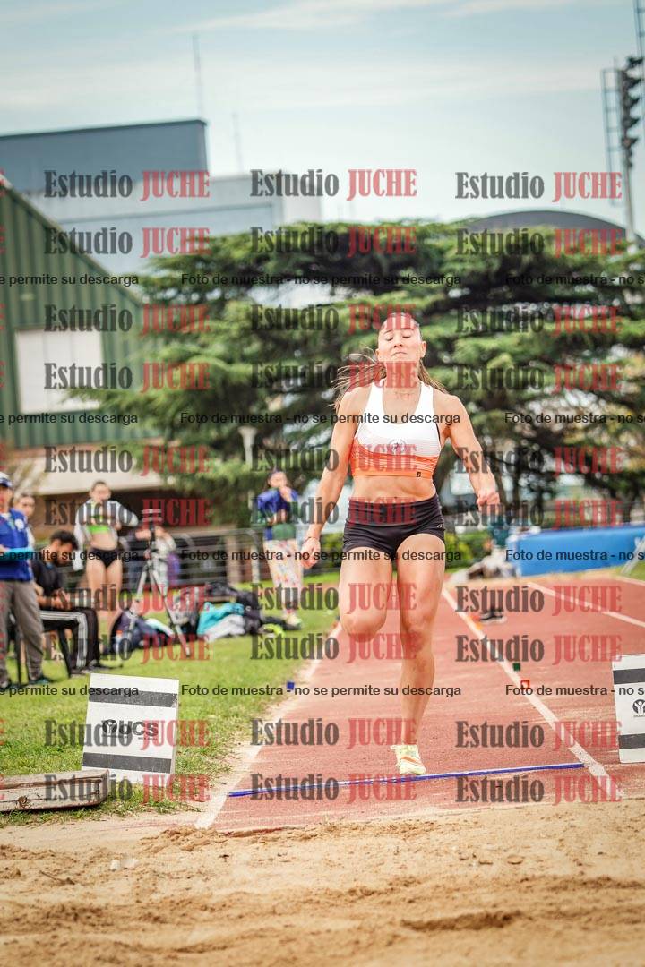 Fotos del salto en largo de mujeres