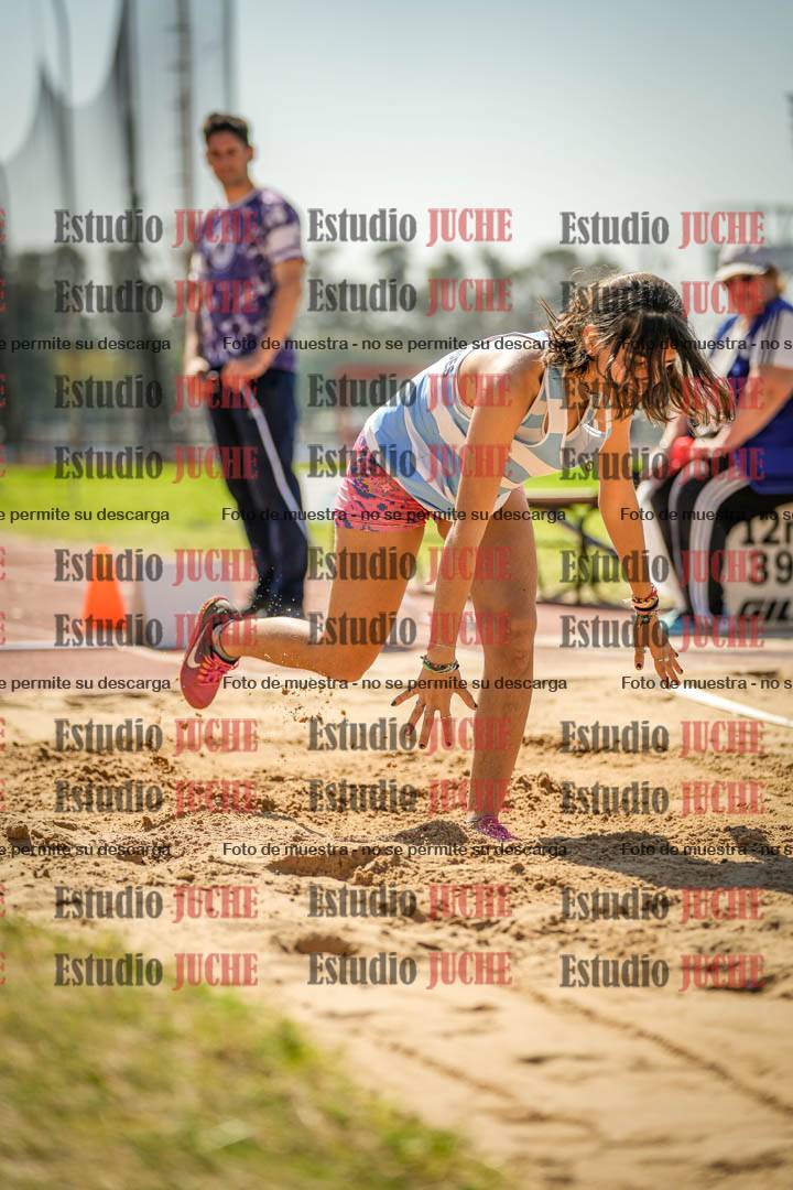 Fotos del salto en largo de mujeres - ambas categorías