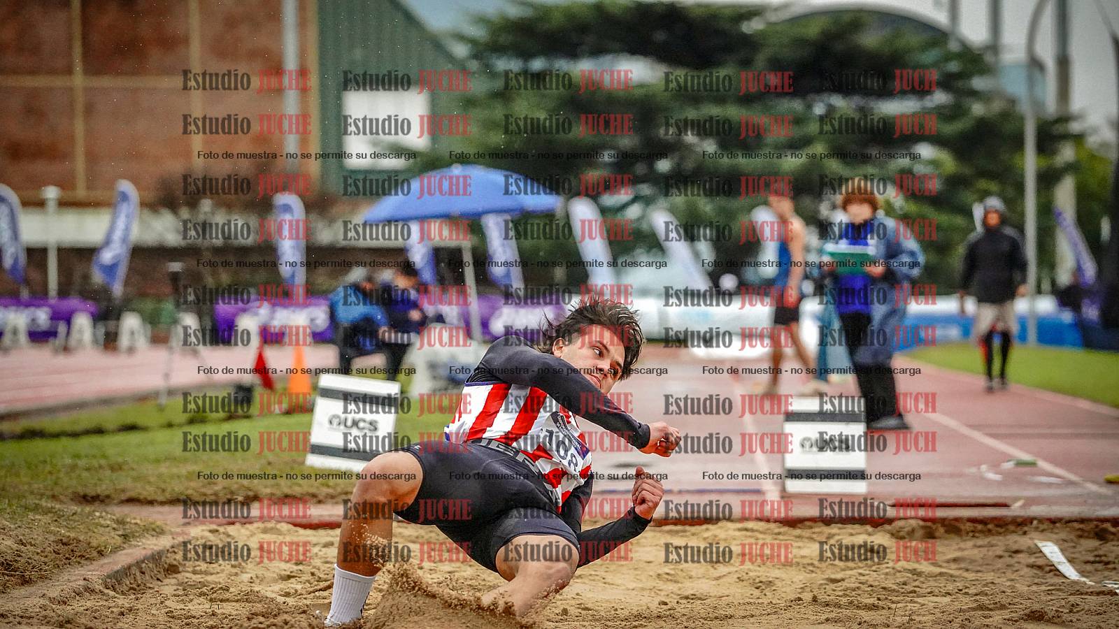 Fotos del salto en largo de varones
