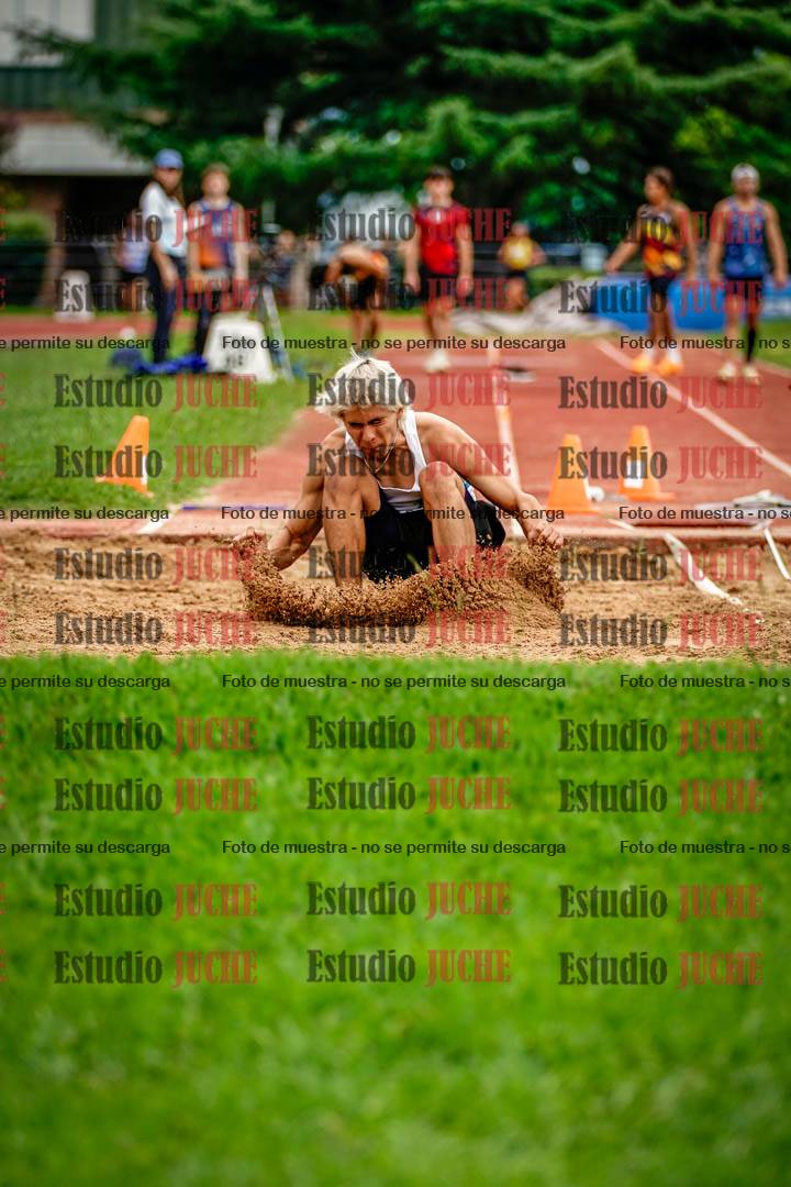 Fotos del salto en largo de varones
