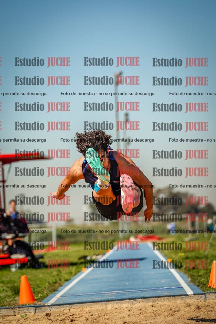 Fotos del salto en largo de varones