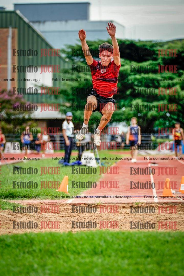 Fotos del salto en largo de varones