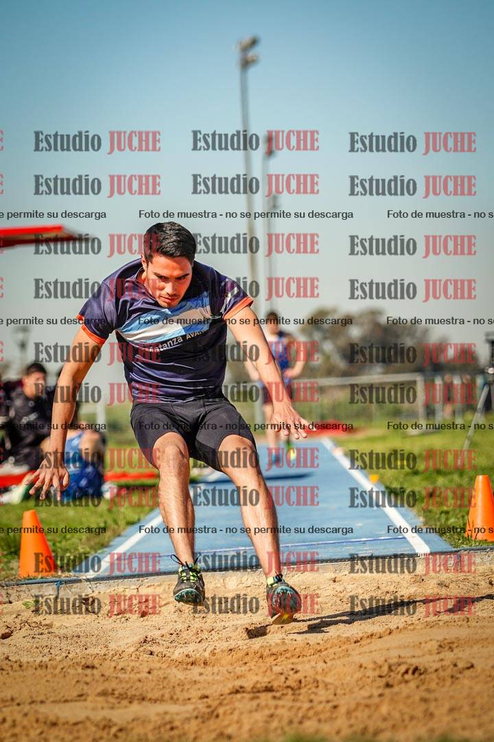 Fotos del salto en largo de varones