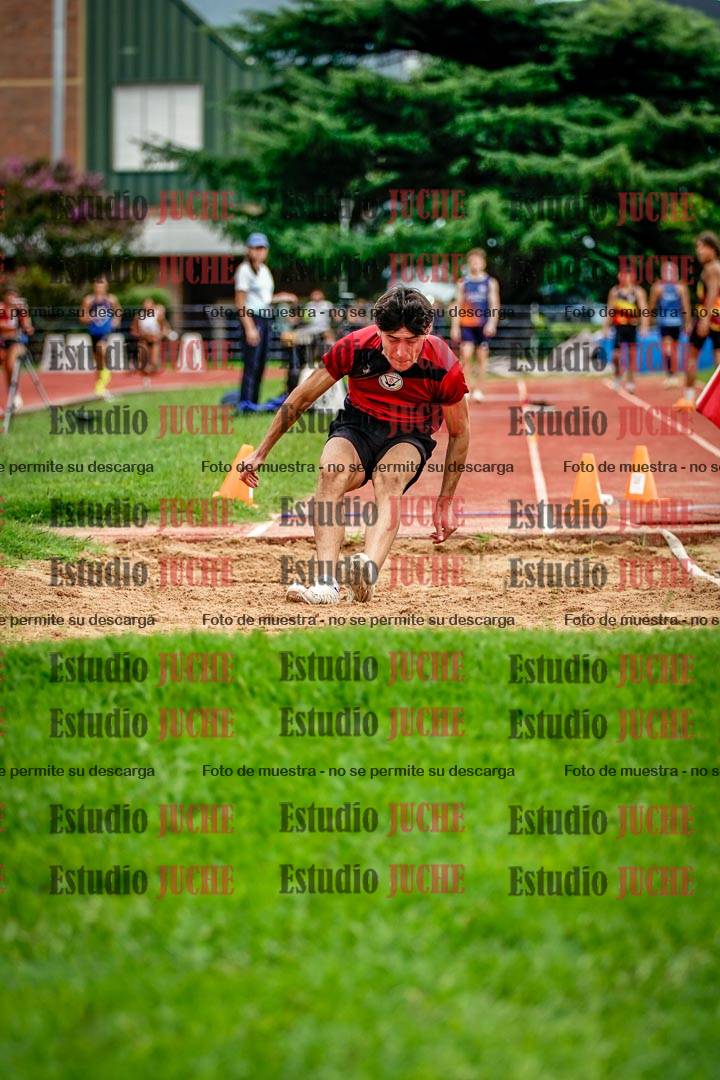 Fotos del salto en largo de varones