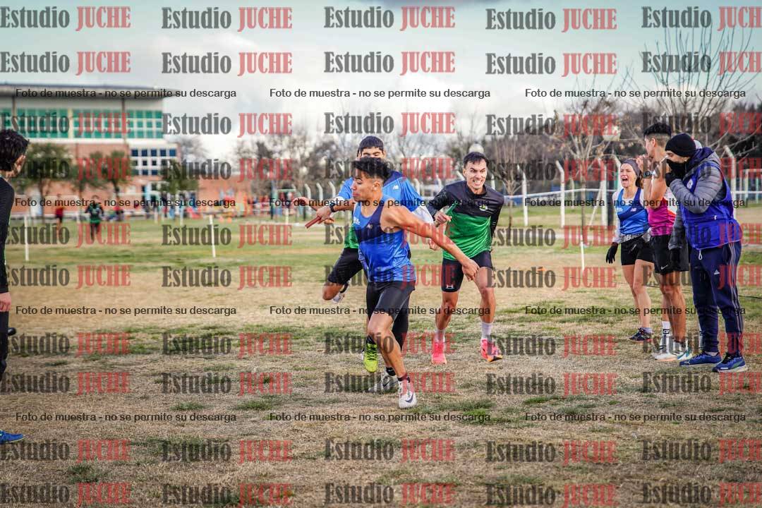 Fotos en el primer relevo (1000 m de carrera)