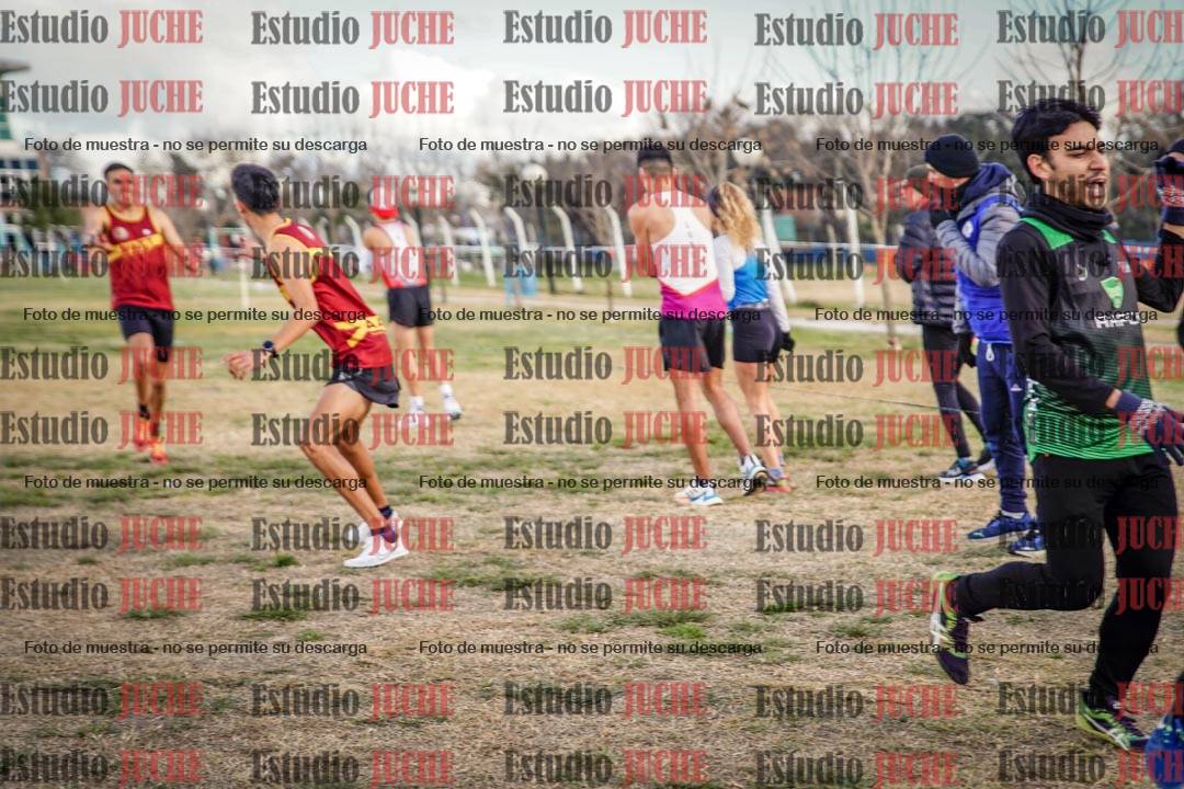 Fotos en el primer relevo (1000 m de carrera)
