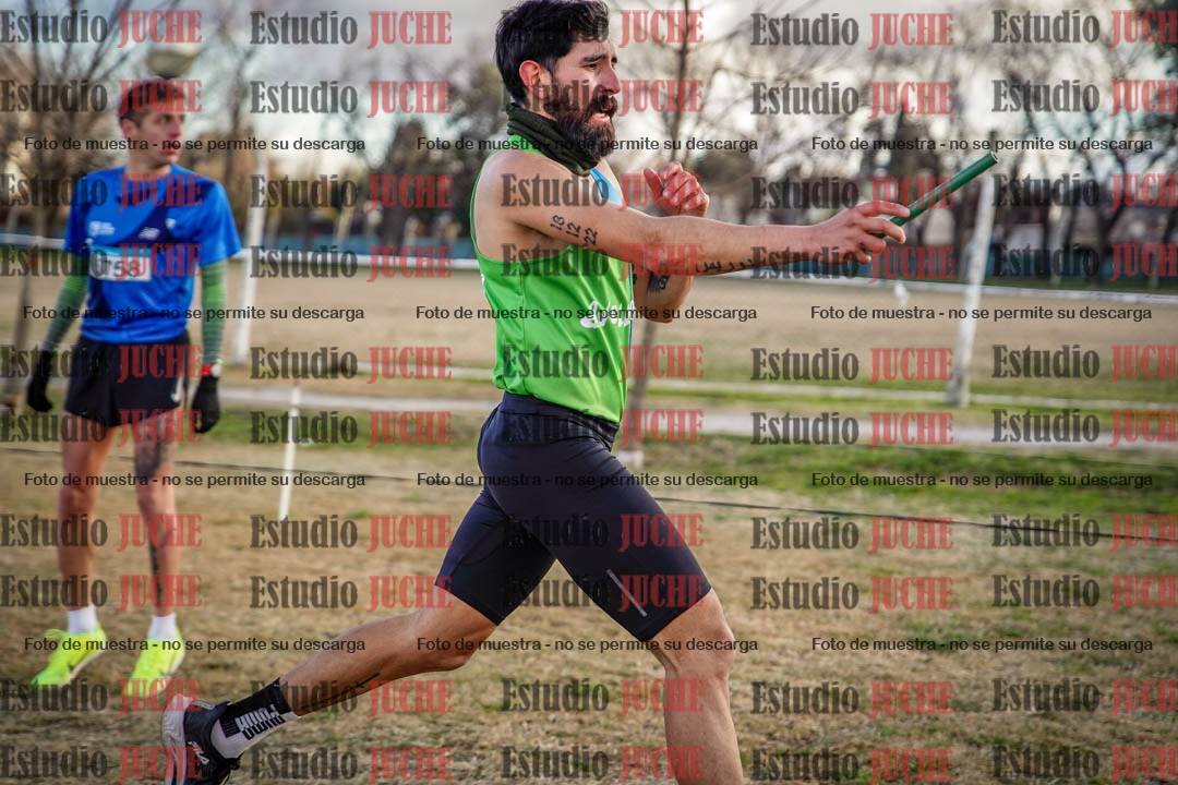 Fotos en el tercer relevo (3000 m de carrera)