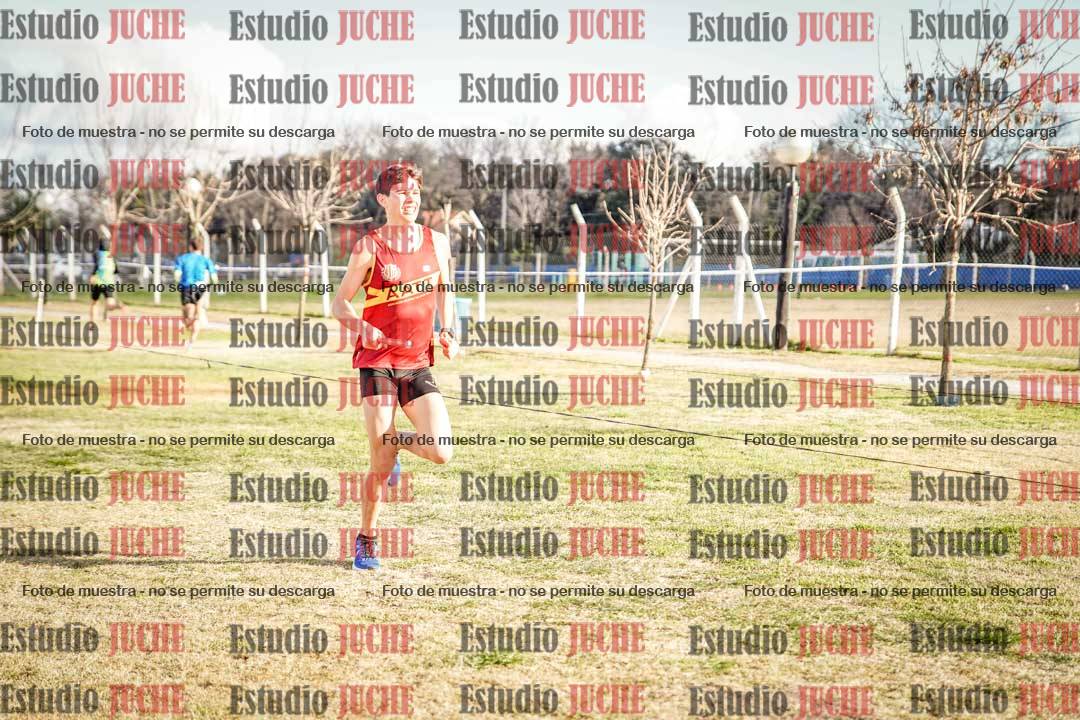 Fotos en el tercer relevo (3000 m de carrera)