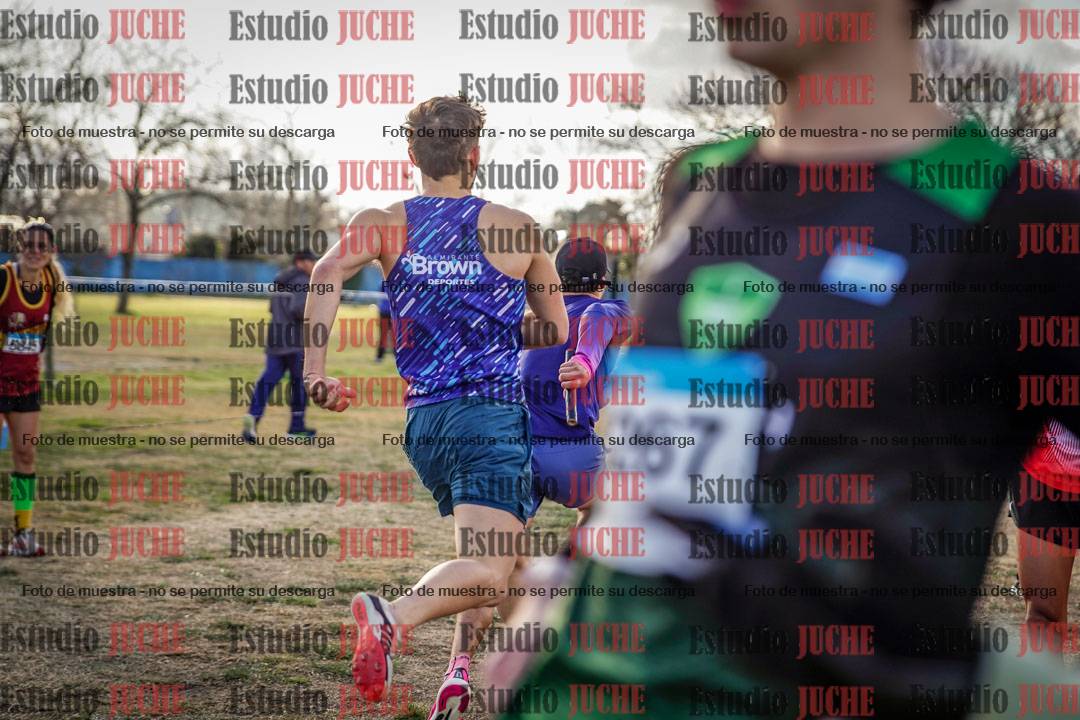 Fotos en el tercer relevo (3000 m de carrera)