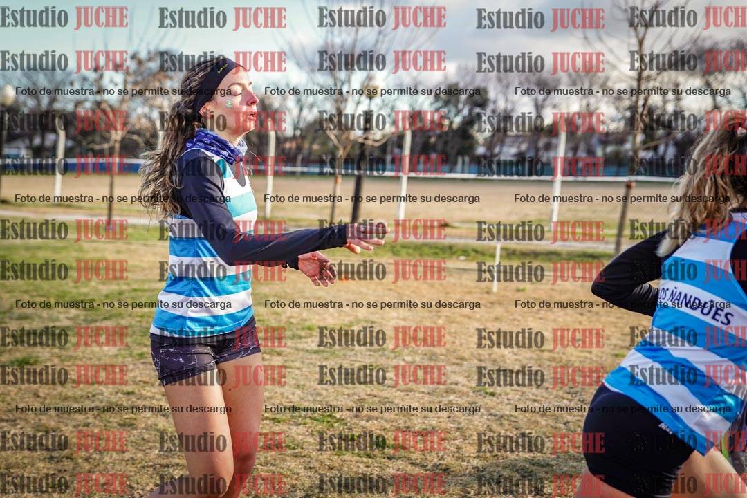 Fotos en el tercer relevo (3000 m de carrera)