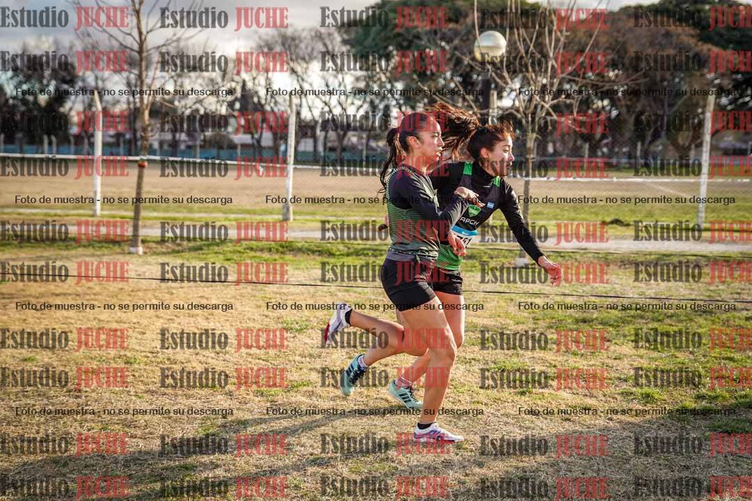 Fotos en el tercer relevo (3000 m de carrera)
