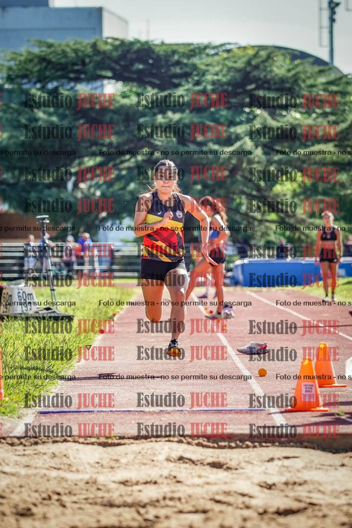 Fotos del salto en largo de mujeres