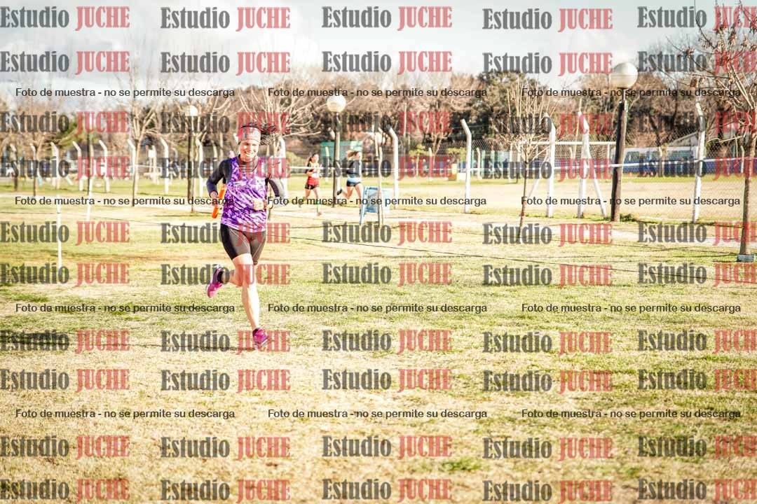 Fotos en el tercer relevo (3000 m de carrera)
