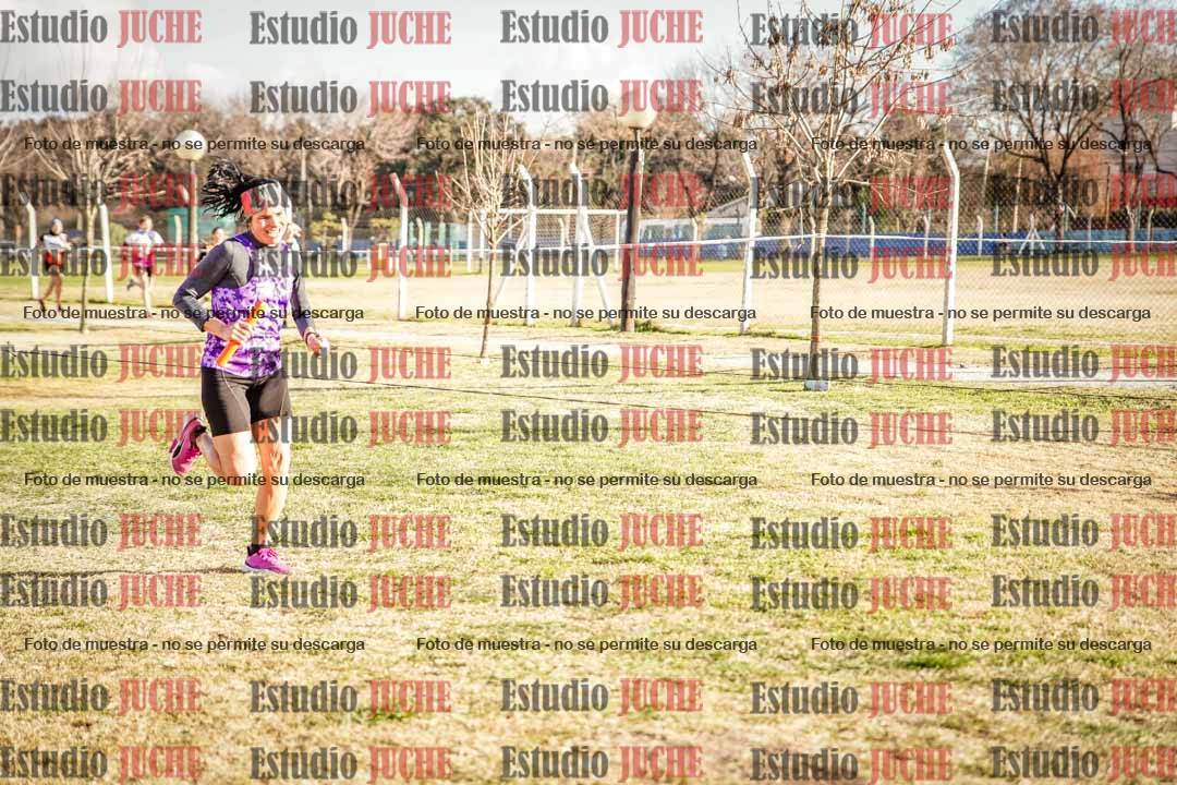 Fotos en el tercer relevo (3000 m de carrera)