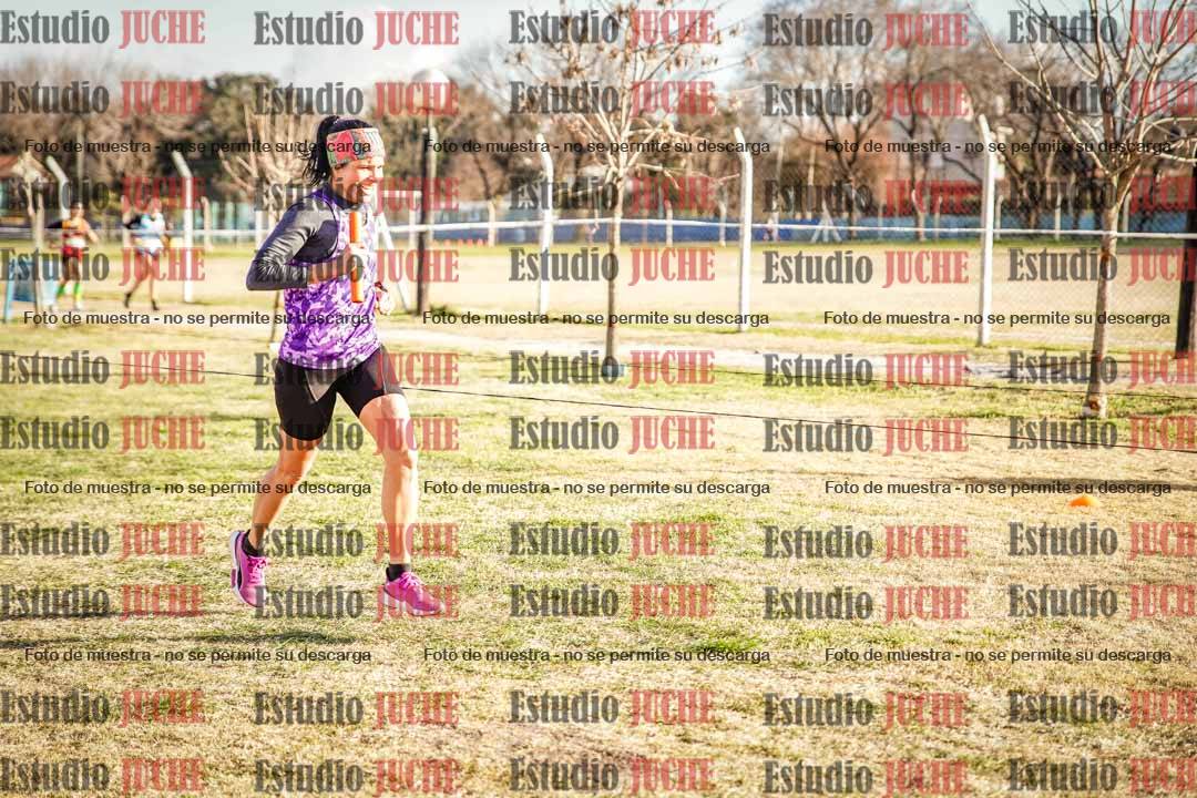 Fotos en el tercer relevo (3000 m de carrera)