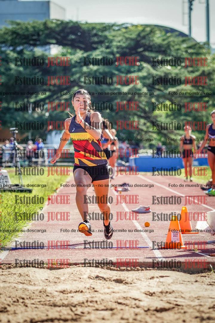 Fotos del salto en largo de mujeres