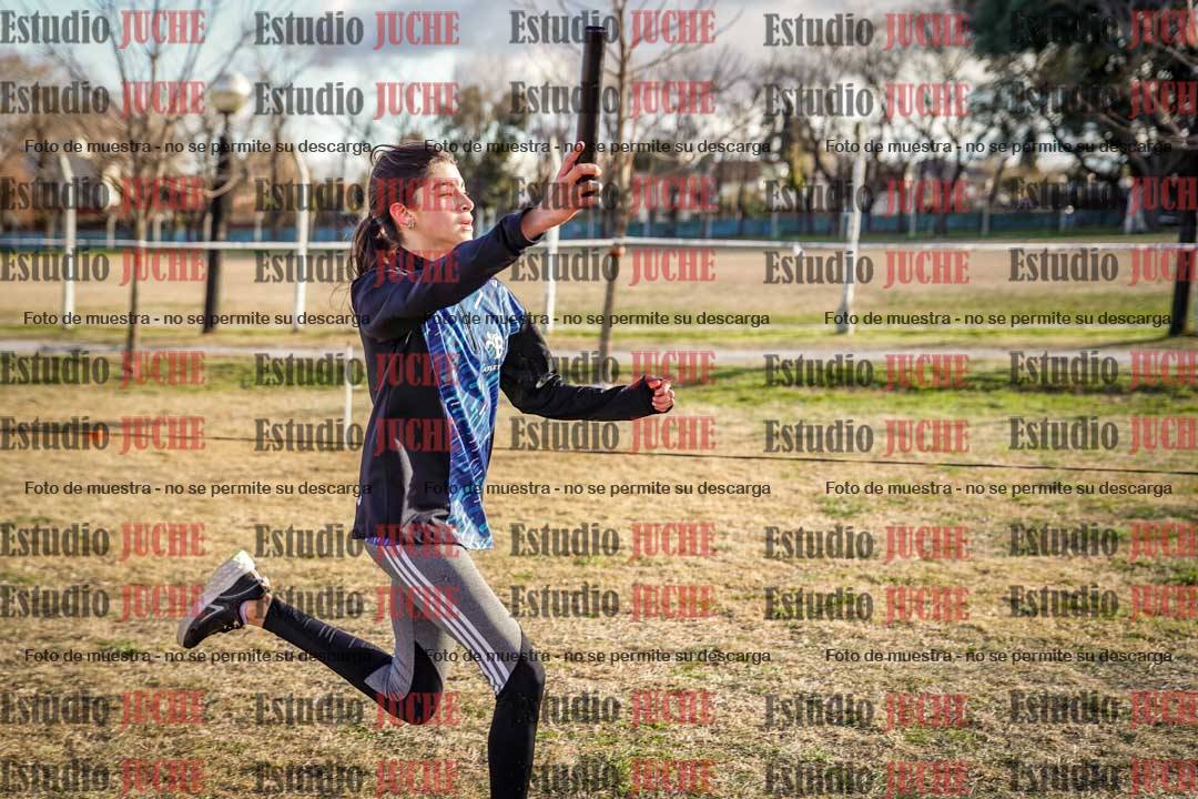 Fotos en el tercer relevo (3000 m de carrera)